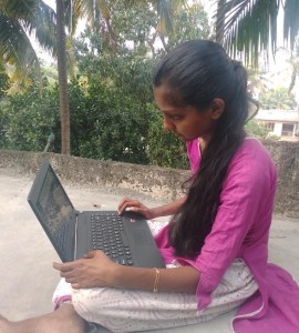 Rabisha with her new laptop