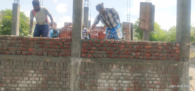 Workers building in India